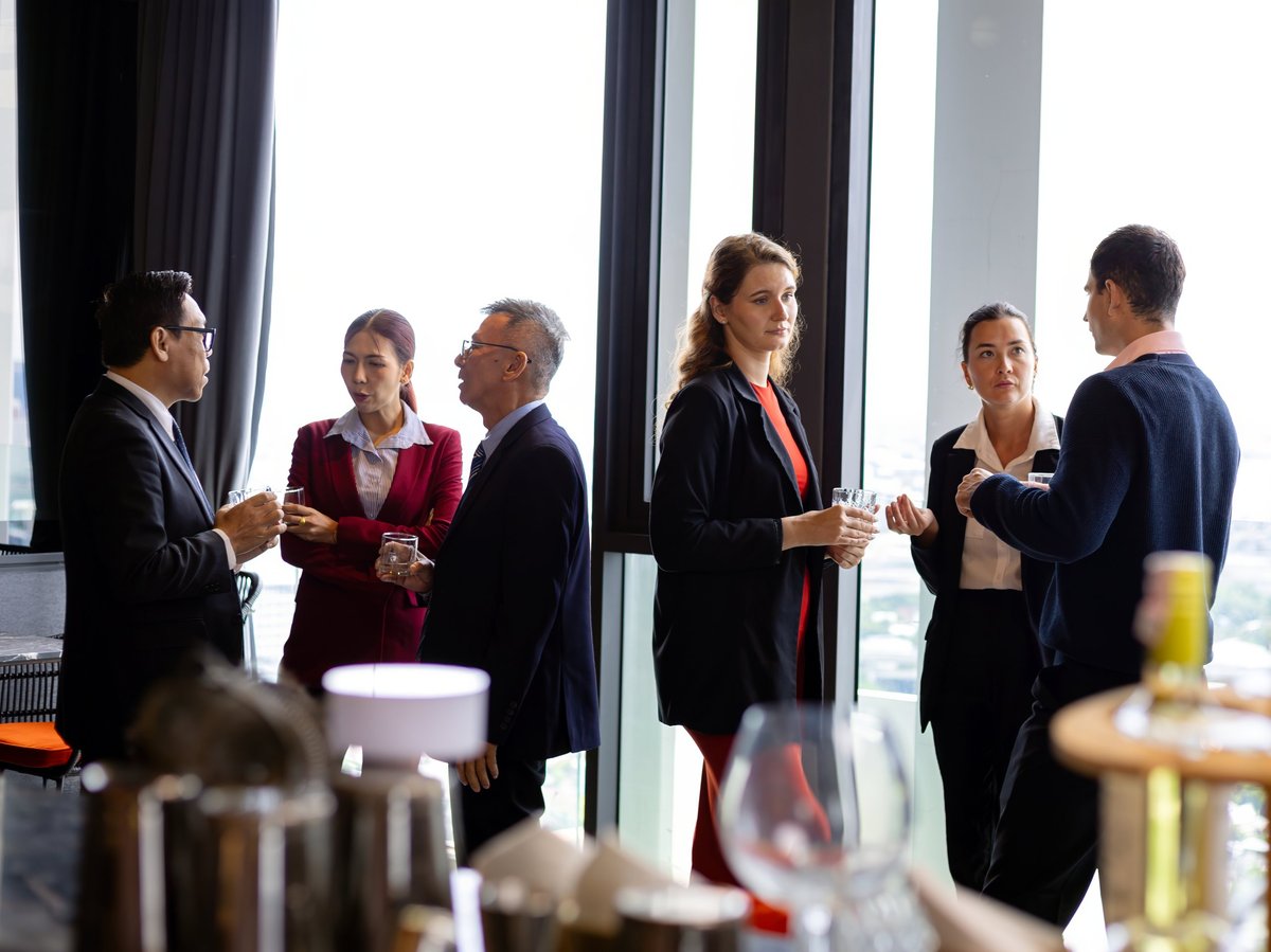 Business professionals networking at corporate event